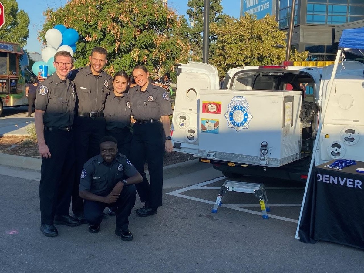 Explorers with the Denver Police ice cream truck at a community event