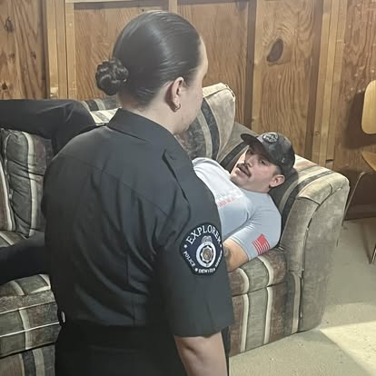 An Explorer interviews a role player during a scenario training exercise